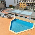 piscina y tenis